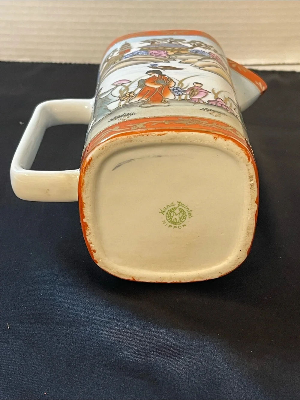 Nippon Porcelain Serving Pitcher in Orange and Multicolor